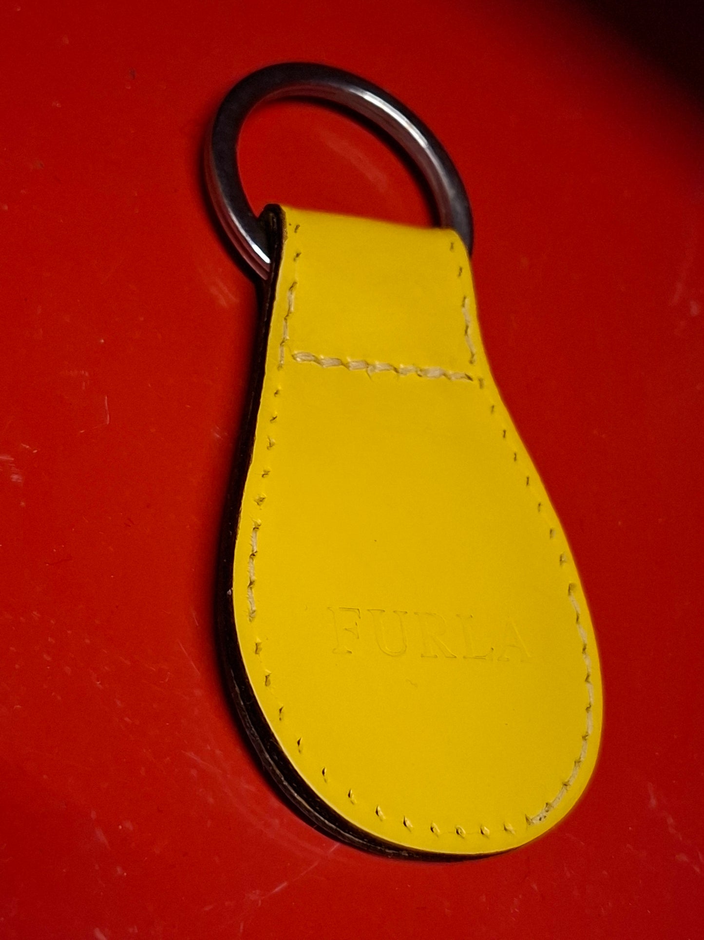 Gelber Schlüsselanhänger FURLA