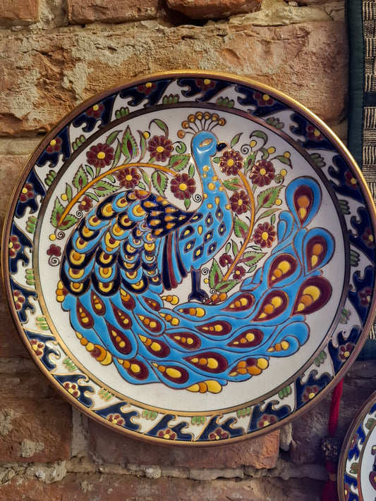 Dekorativer Pfauen-Wandteller